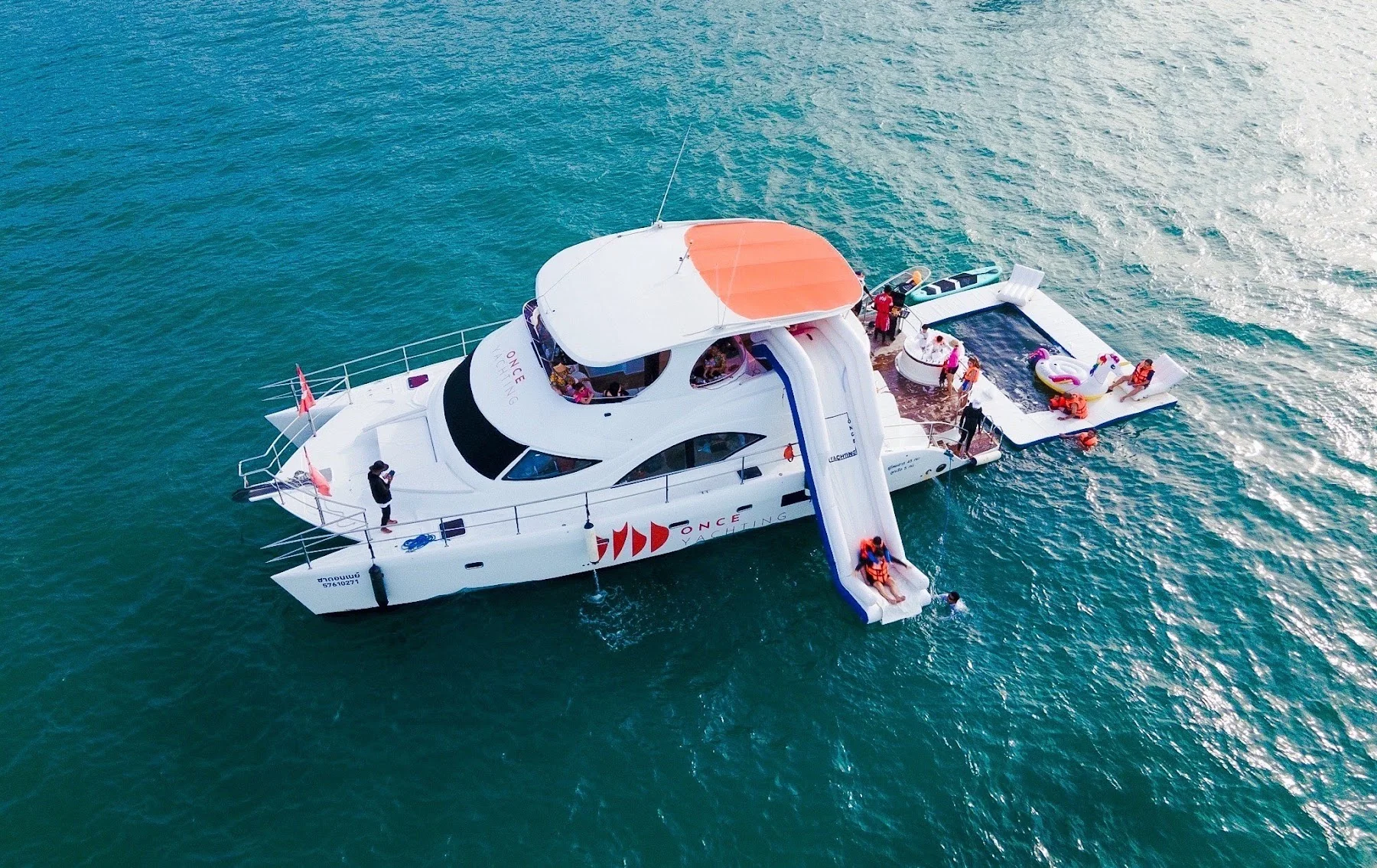 Chardonnay power catamaran in coastal waters