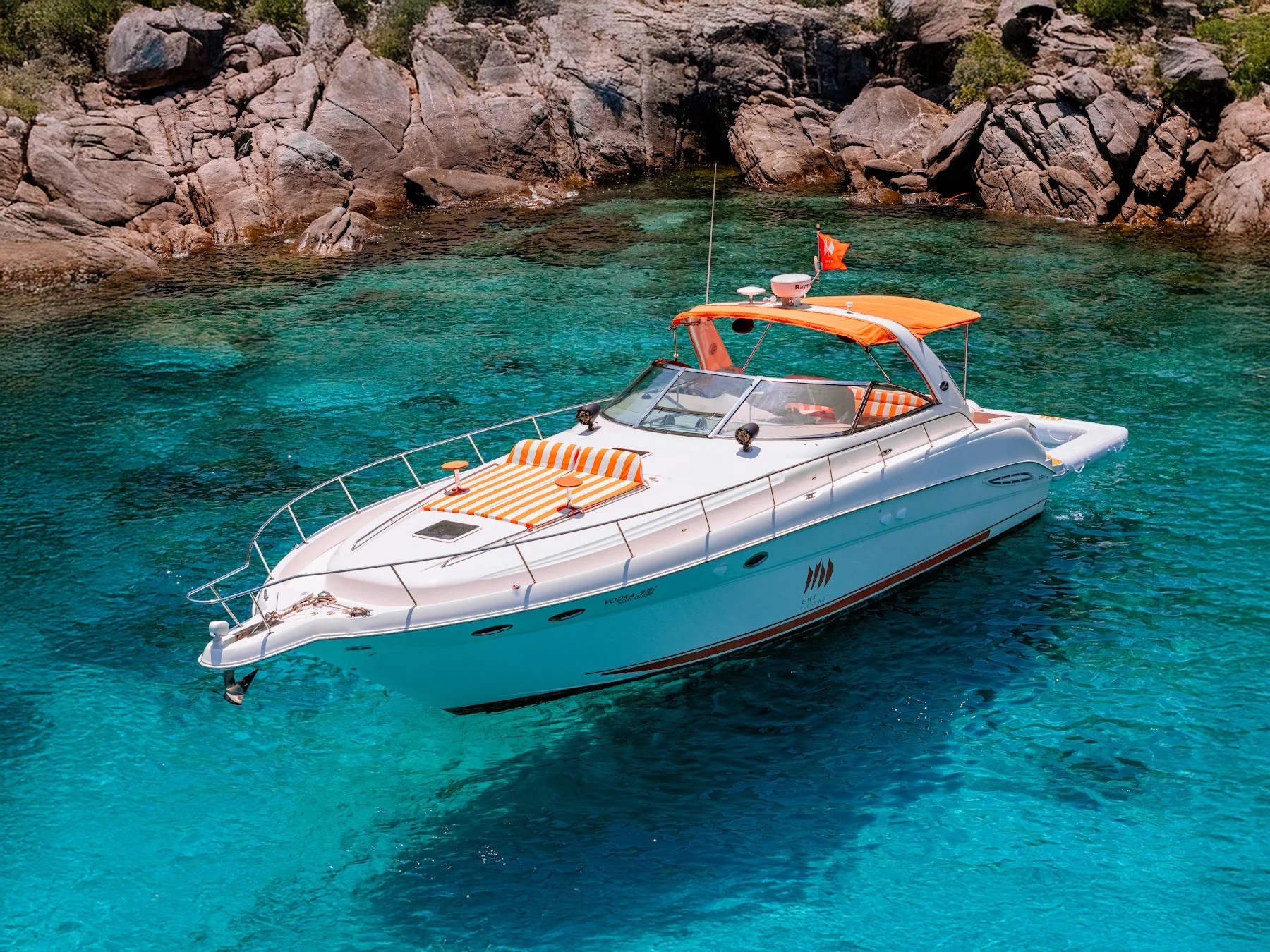 Vodka motor yacht in coastal waters